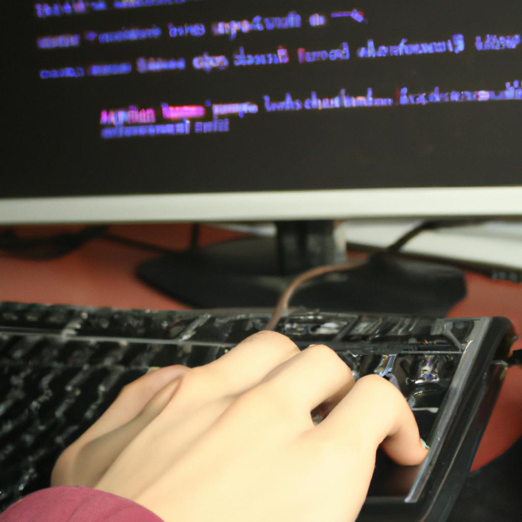 Person writing code on computer